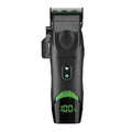 Black and green hair clipper with digital display on a light gray background